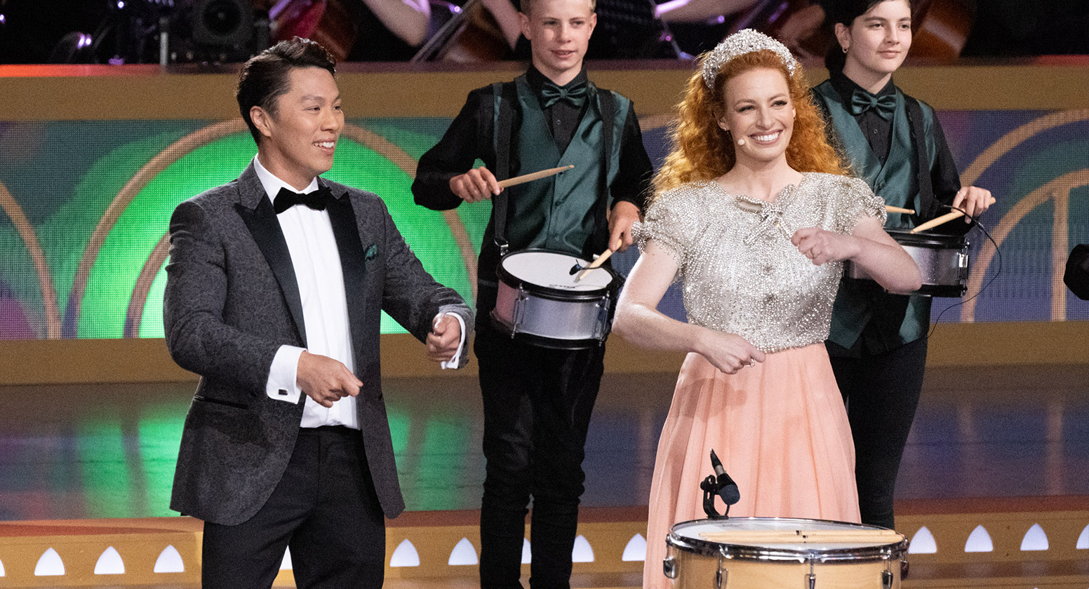 Emma Watkins and Elvin Melvin playing the drums at Carols by Candlelight