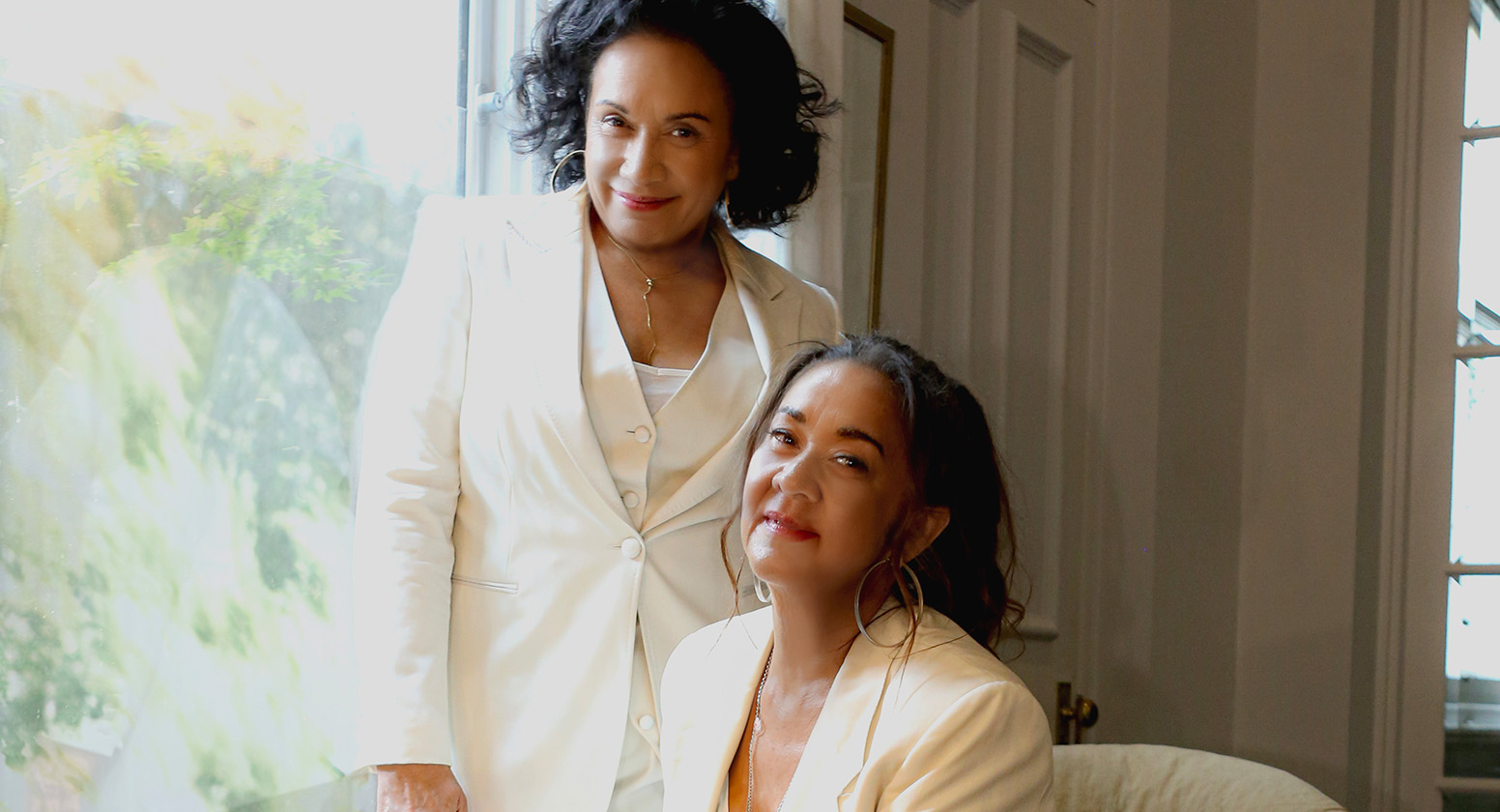 Vika and Linda Bull wearing cream suits